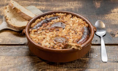 French specialty: cassoulet, a meal with white beans, duck leg, sausage and bacon.