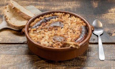 French specialty: cassoulet, a meal with white beans, duck leg, sausage and bacon.