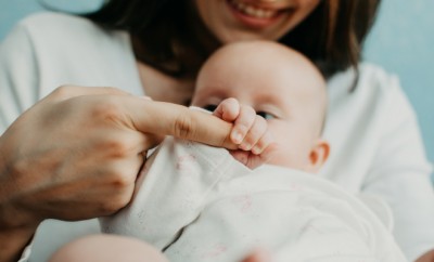 Mental Health in Postpartum Time. Maternal Mental Health. How to avoid pregnancy And Postpartum Disorders, postpartum baby blues, depression. Portrait of happy mother and newborn baby.