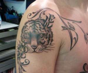 photo Kipik * tatouage *piercing St Tropez 8249