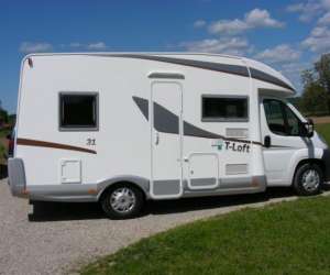 photo Location de camping car, vente et pose d'accessoires Tauriac 3819